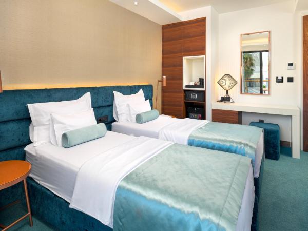 Time Boutique Hotel : photo 4 de la chambre chambre double ou lits jumeaux standard avec balcon - parking gratuit