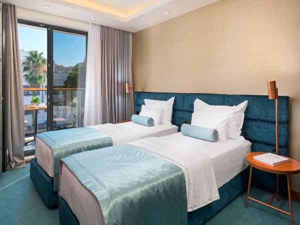 Time Boutique Hotel : photo 5 de la chambre chambre double ou lits jumeaux standard avec balcon - parking gratuit