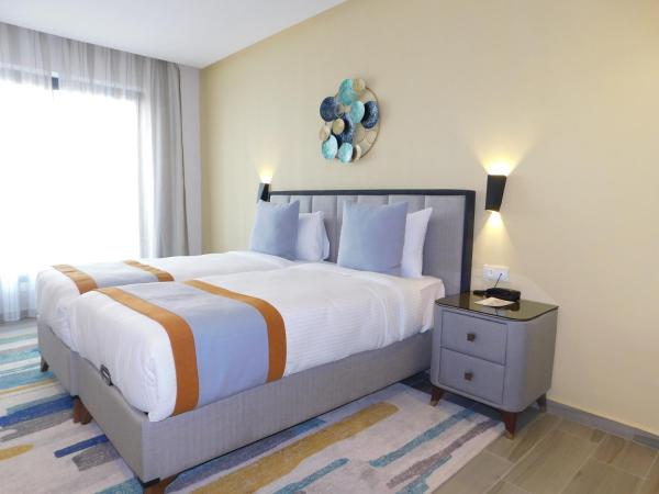 Gardenia Boutique Hotel : photo 4 de la chambre chambre lits jumeaux pour personnes à mobilité réduite