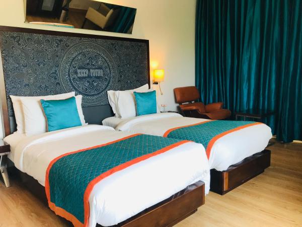 Golden Tulip Gurgaon Sector 29 : photo 8 de la chambre chambre supérieure avec 2 lits simples