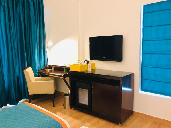 Golden Tulip Gurgaon Sector 29 : photo 2 de la chambre chambre supérieure avec 2 lits simples