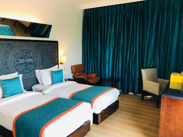 Golden Tulip Gurgaon Sector 29 : photo 10 de la chambre chambre supérieure avec 2 lits simples