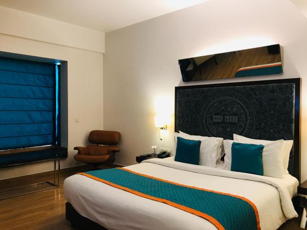 Golden Tulip Gurgaon Sector 29 : photo 9 de la chambre deluxe room 1 queen bed garden view