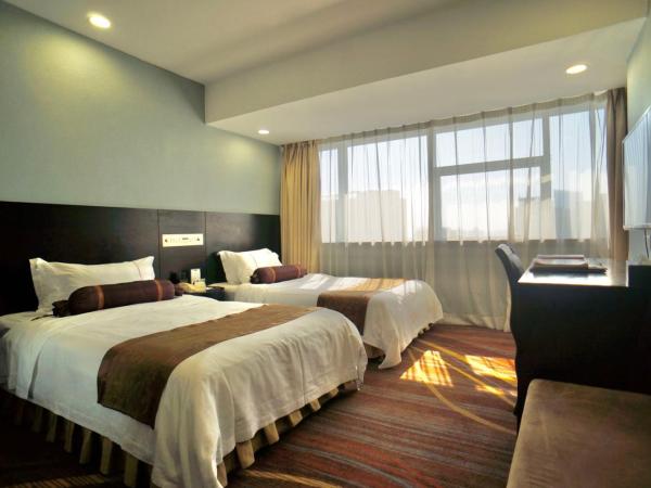 Skyline Plaza Hotel Guangzhou : photo 6 de la chambre chambre lits jumeaux deluxe