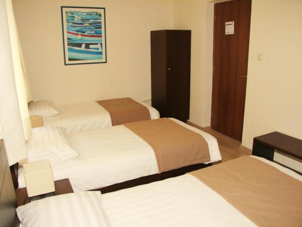 Rea Hotel : photo 3 de la chambre chambre triple Économique