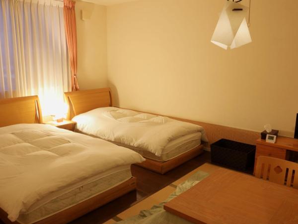 RokuRoku : photo 5 de la chambre chambre lits jumeaux avec salle de bains