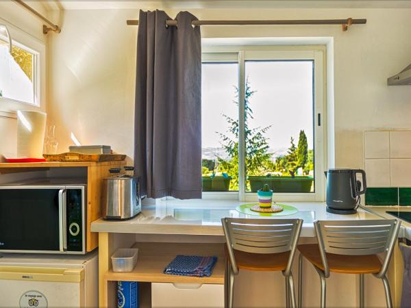 Ecuries Sainte Croix : photo 7 de la chambre appartement - rez-de-chaussée