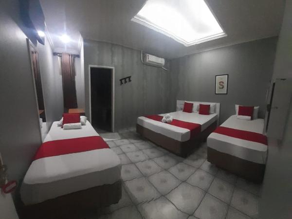 Hotel Tiquatira - Zona Leste : photo 4 de la chambre chambre triple standard