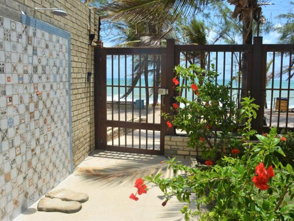 Na praia - Araça 104 - Térreo frente mar : photo 10 de la chambre appartement - vue sur mer et jardin