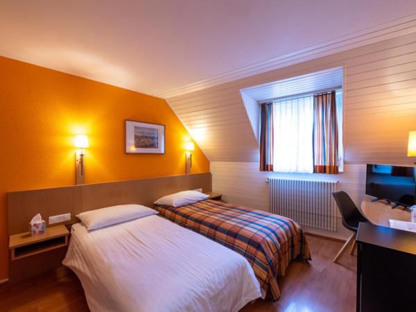 Les Negociants : photo 3 de la chambre chambre lits jumeaux standard