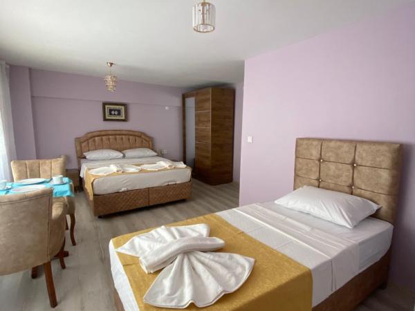 Garden House : photo 2 de la chambre chambre triple confort avec douche