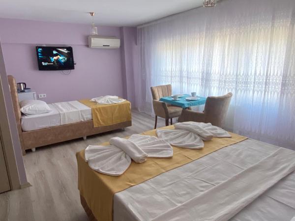 Garden House : photo 3 de la chambre chambre triple confort avec douche