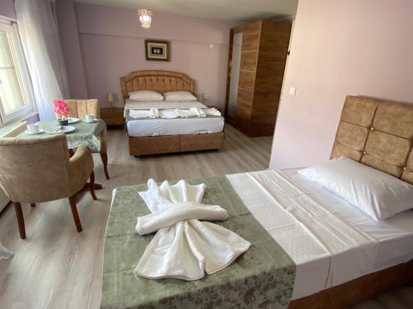 Garden House : photo 1 de la chambre chambre triple confort avec douche