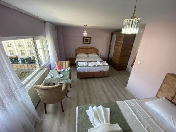 Garden House : photo 5 de la chambre chambre triple confort avec douche