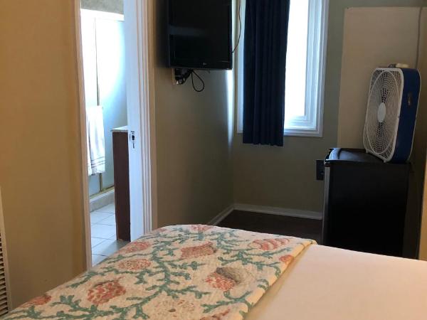 Rest Haven Motel : photo 9 de la chambre chambre lit queen-size