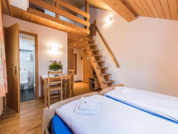 Hotel Alpenrose beim Ballenberg : photo 3 de la chambre chambre quadruple