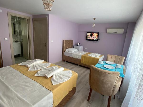 Garden House : photo 8 de la chambre chambre triple confort avec douche