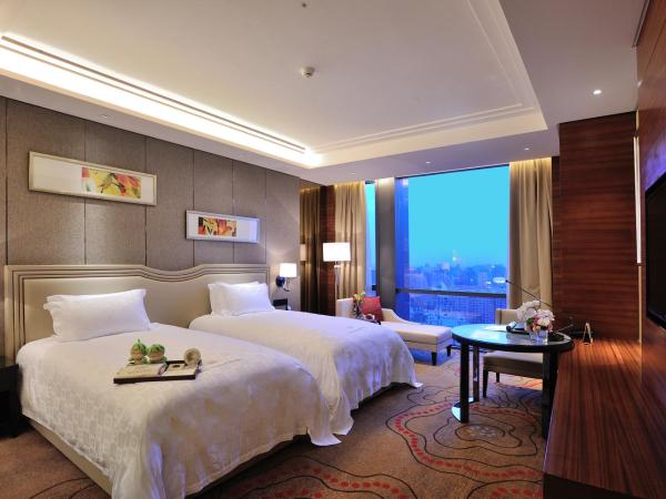 Dongguan Kande International Hotel : photo 4 de la chambre chambre lits jumeaux deluxe