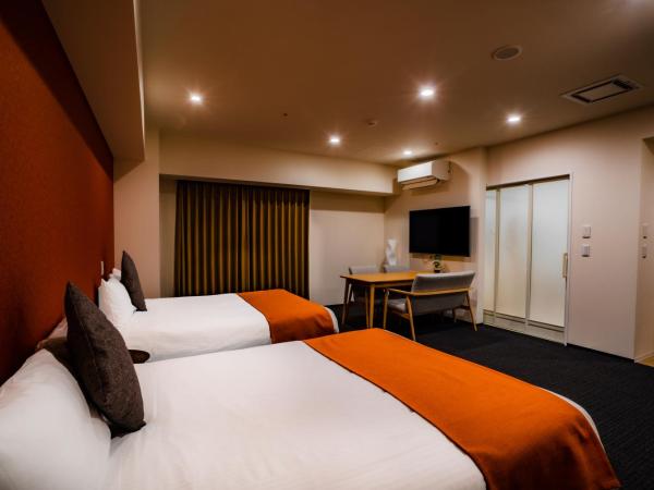 Randor Hotel Sapporo Suites : photo 1 de la chambre chambre familiale supérieure