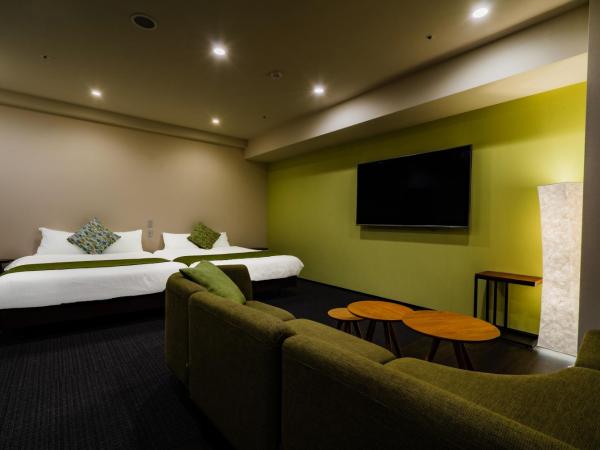 Randor Hotel Sapporo Suites : photo 2 de la chambre suite avec baignoire spa