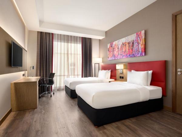 Ramada Encore by Wyndham Muscat Al-Ghubra : photo 1 de la chambre chambre lits jumeaux