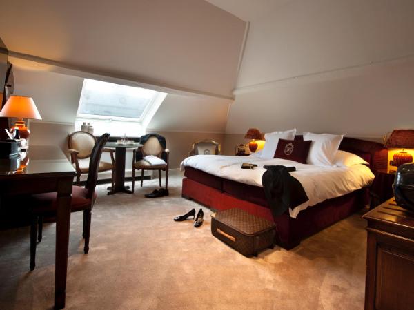 Relais & Châteaux Hotel Heritage : photo 1 de la chambre suite junior - vue sur beffroi