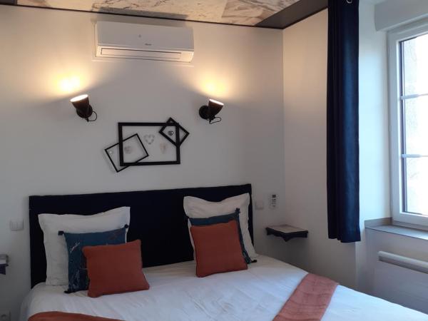 CHARMES EN VILLE Le Charme Poétique : photo 3 de la chambre suite familiale