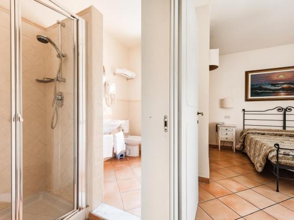 Residence Isola Verde Cisanello : photo 9 de la chambre suite