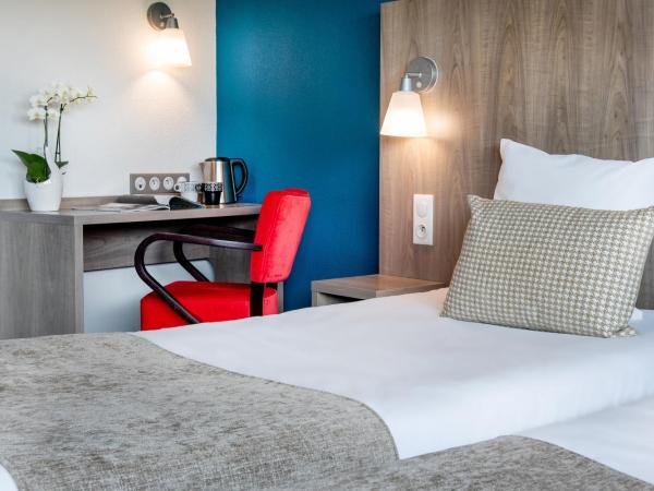 Hôtel Panorama : photo 3 de la chambre chambre lits jumeaux avec balcon