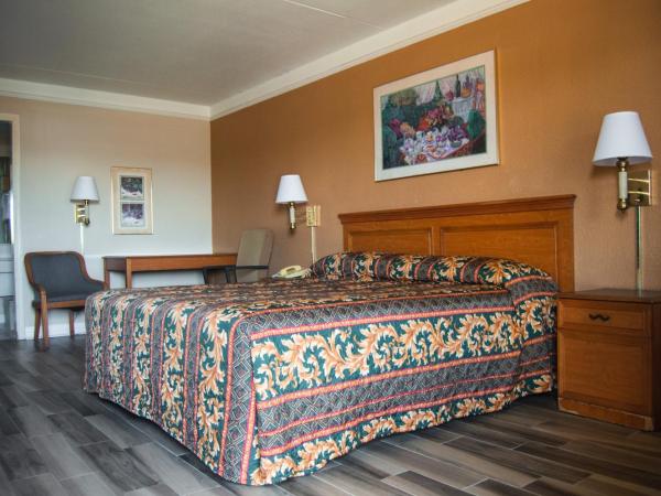 America's Inn Houston/Stafford /Sugarland : photo 1 de la chambre chambre lit king-size