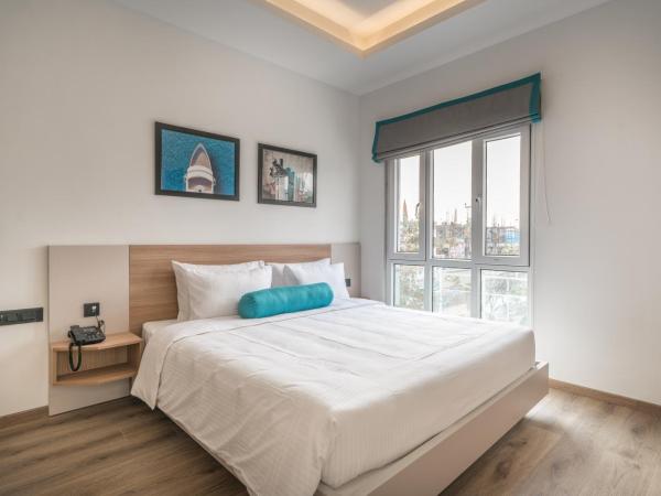 Skyla Serviced Apartments & Suites Jubilee Hills : photo 4 de la chambre chambre lits jumeaux deluxe