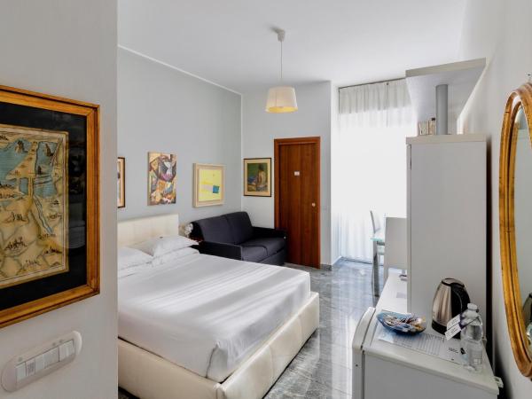 Aiello Suites Executive : photo 1 de la chambre chambre double - vue sur jardin