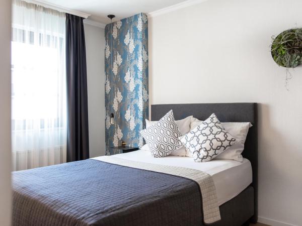 B-Hotel : photo 2 de la chambre ville 1