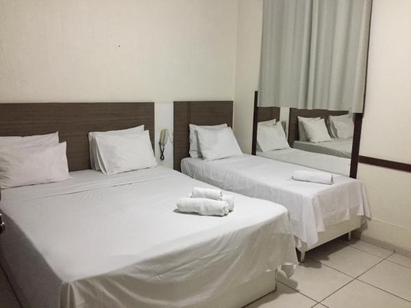 Novo Hotel Barro Preto : photo 2 de la chambre chambre triple