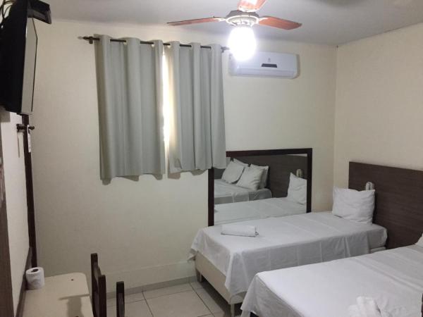 Novo Hotel Barro Preto : photo 8 de la chambre chambre triple