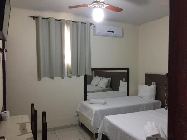 Novo Hotel Barro Preto : photo 4 de la chambre chambre triple