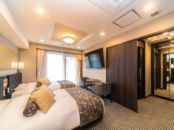 APA Hotel Osaka Temmabashi Ekimae : photo 1 de la chambre chambre lits jumeaux deluxe