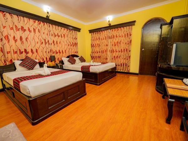 Hotel Bougainvillea : photo 3 de la chambre chambre triple deluxe