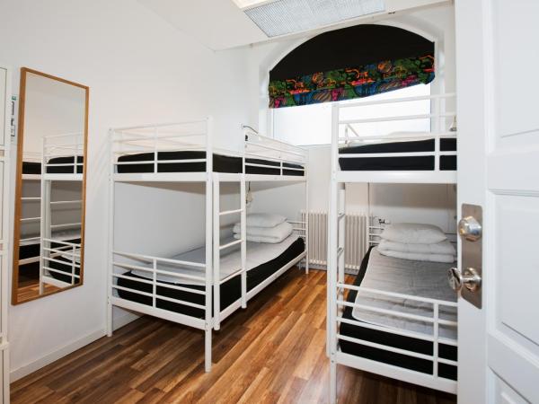 City Backpackers Hostel : photo 10 de la chambre lit dans un dortoir de 4 lits