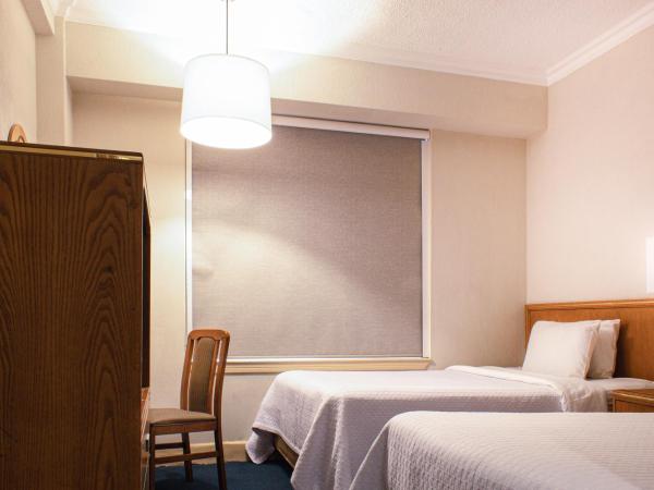 Travohotel Monterrey Histórico : photo 1 de la chambre chambre double avec 2 lits doubles