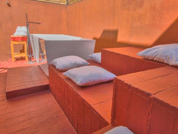 Casa Carmen Reforma : photo 9 de la chambre chambre double deluxe avec baignoire et terrasse