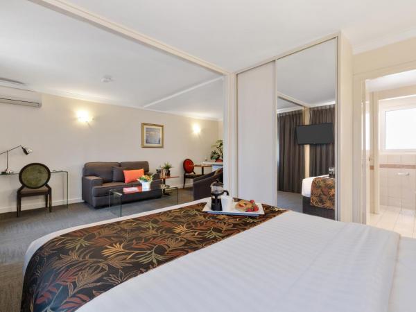 The Peninsula Riverside Serviced Apartments : photo 6 de la chambre studio