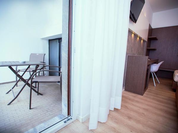 Agape Hotel AA Hotels : photo 5 de la chambre chambre quadruple