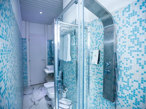 Agape Hotel AA Hotels : photo 7 de la chambre chambre quadruple