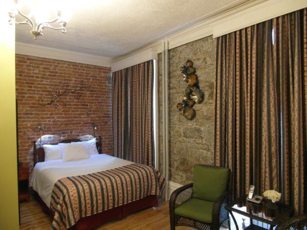 Hôtel Manoir de l'Esplanade : photo 5 de la chambre chambre lit queen-size deluxe