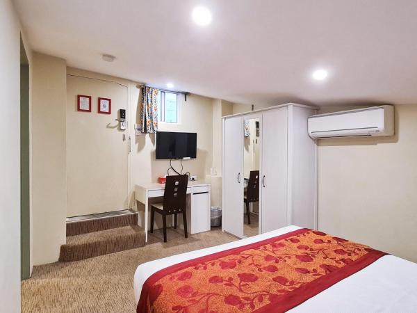 Twin Towers Inn : photo 8 de la chambre petite chambre lit queen-size Économique