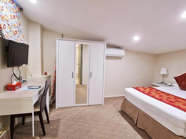 Twin Towers Inn : photo 7 de la chambre petite chambre lit queen-size Économique