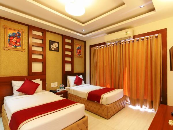 Icon Suites by Bhagini : photo 1 de la chambre chambre lits jumeaux deluxe