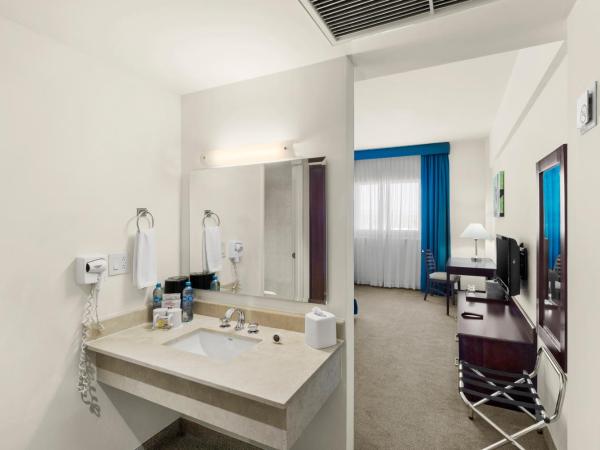 Hotel Aeropuerto Los Cabos : photo 9 de la chambre chambre lit king-size - non-fumeurs