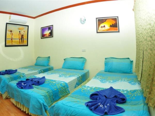 Harmony House-SHA Plus : photo 2 de la chambre chambre triple deluxe avec climatisation